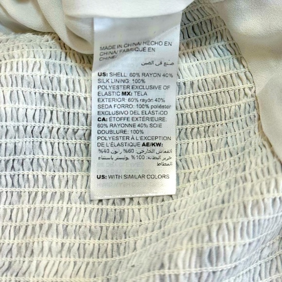 Stunning White House Black Market Silk Surplice Blouse with Fitted Bottom. - Picture 4 of 5